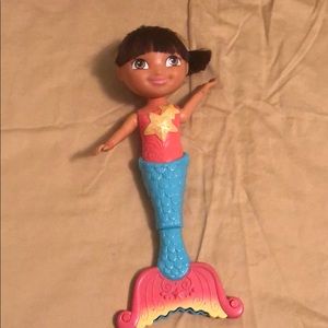 Dive and swim mermaid Dora